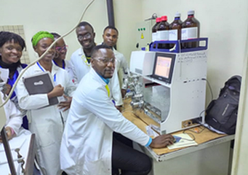 Dr. Ranil Temgoua and students during training on the use of HPLC instrument.